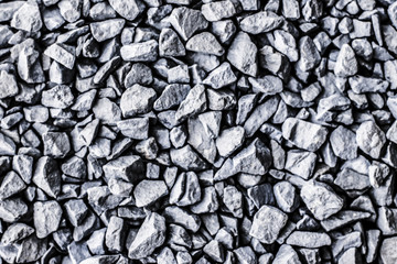 Grey stone pebbles as abstract background texture, landscape architecture backdrop, interior design...