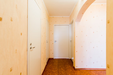 Russia, Omsk- August 02, 2019: interior room apartment. standard repair decoration in hostel. corridor, hallway, doors