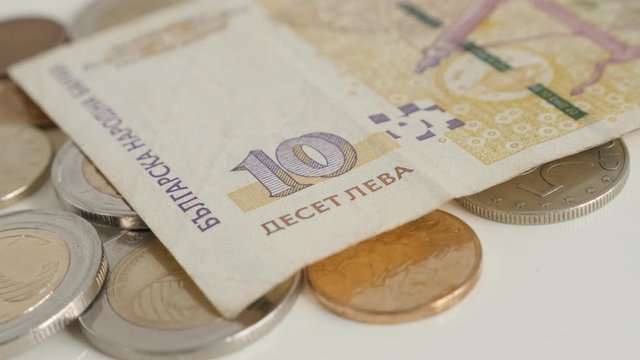 Coins and banknotes of Bulgarian lev national currency 4K panning video