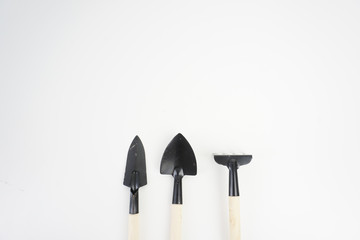 Gardening tools over white background