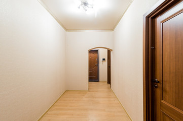 Russia, Omsk- August 02, 2019: interior room apartment. standard repair decoration in hostel. corridor, hallway, doors