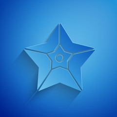 Paper cut Christmas star icon isolated on blue background. Merry Christmas and Happy New Year. Paper art style. Vector Illustration © Oksana