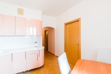 Fototapeta na wymiar Russia, Omsk- August 02, 2019: interior room apartment. standard repair decoration in hostel. kitchen, dining area