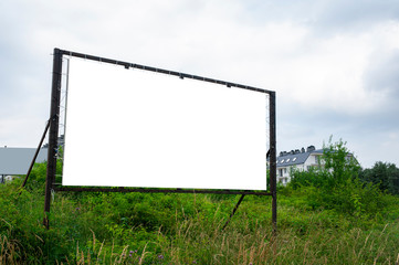 Blank white advertising billboard on the residential area