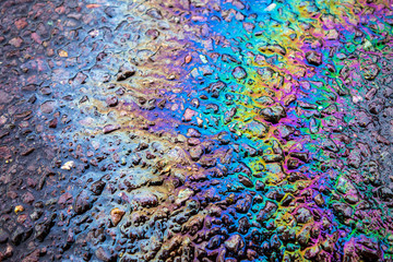 Petrol Oil Pollution Rainbow Gasoline Leak on Pavement