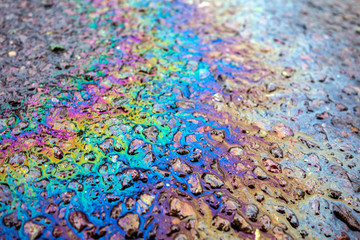 Petrol Oil Pollution Rainbow Gasoline Leak on Pavement