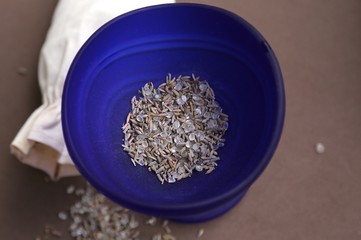 Bath-taking salt and lavender seeds for smell are spread in the glass