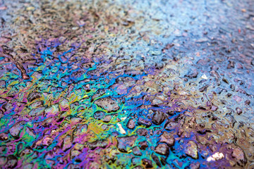 Petrol Oil Pollution Rainbow Gasoline Leak on Pavement