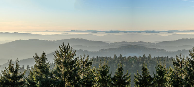 Amazing panorama background banner long from a fog landscape in the morning in black forest