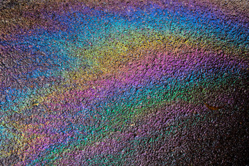 Petrol Oil Pollution Rainbow Gasoline Leak on Pavement