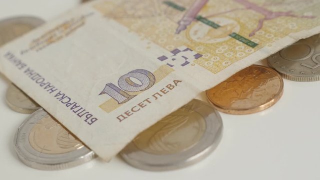 Coins and banknotes of Bulgarian lev 4K panning video