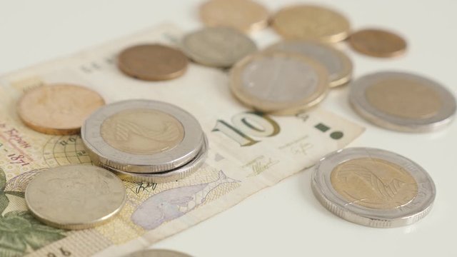 Tilting on Bulgarian lev stack of coins and paper money 4K video