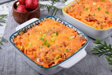 Casserole with sweet potato and cheese in a one portion baking dish