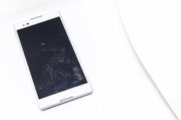 broken phone with cracked screen