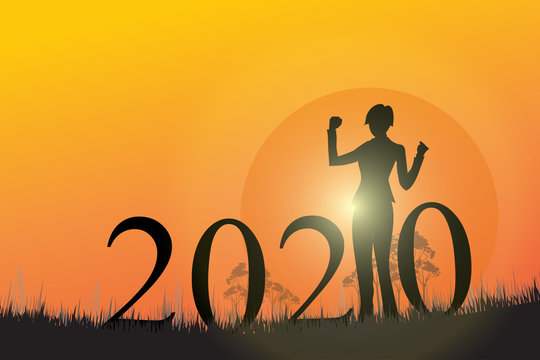 Silhouette of young woman cheerful on the hill with 2020 happy new year. Conceptual image of freedom and success in New year.