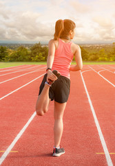 Obraz premium Sporty asian woman runner in fashionable sportswear