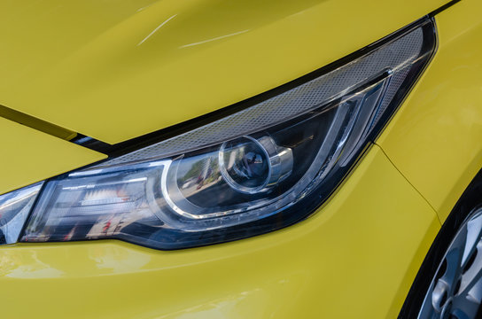 Yellow car headlights © khunkornStudio