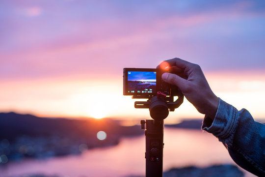 Camera on stabilizer is recording beautiful view at twilight