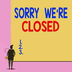 Text sign showing Sorry We Re Closed. Business photo showcasing Expression of Regret Disappointment Not Open Sign Back view young woman watching blank big rectangle. Geometrical background