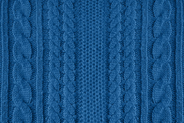 Blue knitted wool texture can use as background.Blue trend color