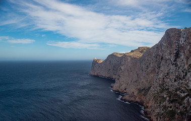 Fototapeta na wymiar Landscape of the Mediterranean coast with mountains and cliffs with a blue sky from a great height