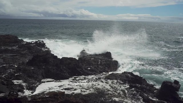 Ocean Waves Bursting onto a Rocky Shoreline