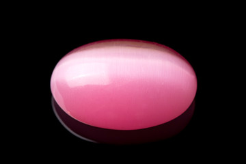 Pink Jade Cabochon Gemstone on Black Background