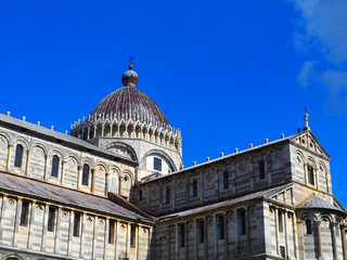 View of the Pisa Cathedral (Duomo di Pisa) in Pisa, Italy. It is located in Miracoli Square (Piazza dei Miracoli).