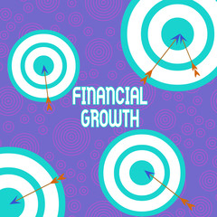 Conceptual hand writing showing Financial Growth. Concept meaning increase in finances of an organization or individual Arrow and round target asymmetrical shape multicolour design