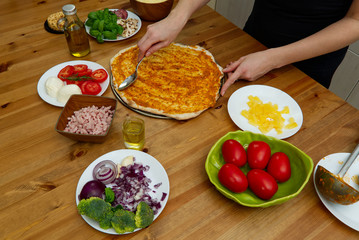 homemade pizza. ingredients, pizza base, tomato sauce