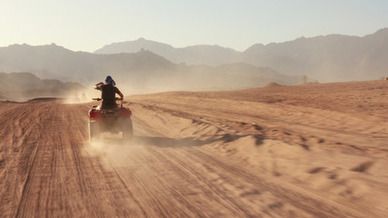 Quad bike ride through the desert near Sharm el Sheikh, Egypt.Adventures of desert off-road on...