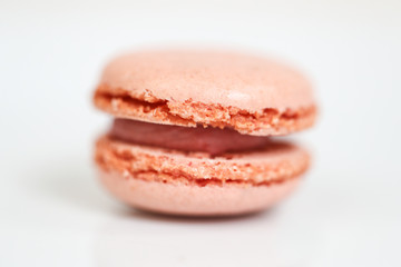 Delicious macaron sweets arranged in rows, colorful macaroon dessert on white background. -Image