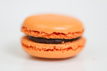 Delicious macaron sweets arranged in rows, colorful macaroon dessert on white background. -Image