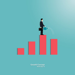 Fototapeta premium Businessman watering small graph growing