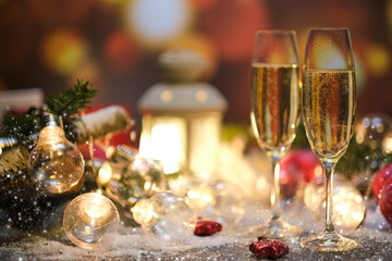 glasses with champagne against the background of New Year's decoration © ZoomTeam