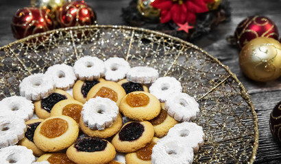 Obraz na płótnie Canvas Cookies surrounded by Christmas decorations