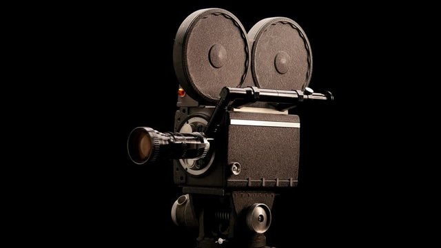 Movie Camera in Front of Black Backdrop.