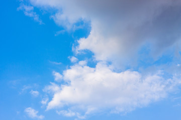 white clouds in a blue sky