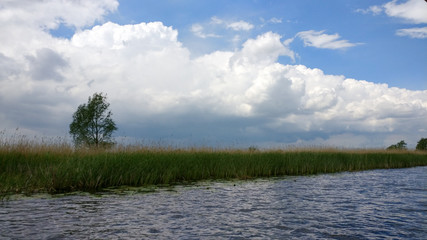 landscape with lake and blue sky
