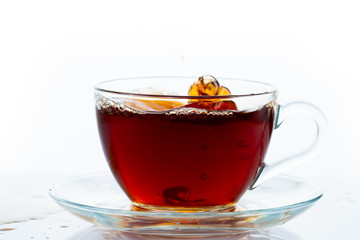 Cup of tea on white background