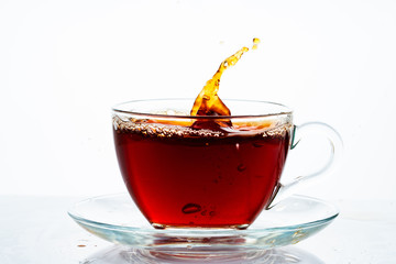 Cup of tea on white background