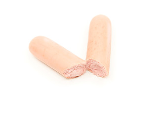 Fresh boiled sausages, close-up, isolated on white background