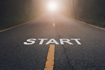 Conceptual image with word start on asphalt road .Start Your Life