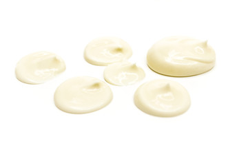 Handful of mayonnaise isolated on white closeup