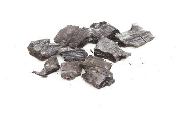 Fototapeta premium black charcoal on a white background