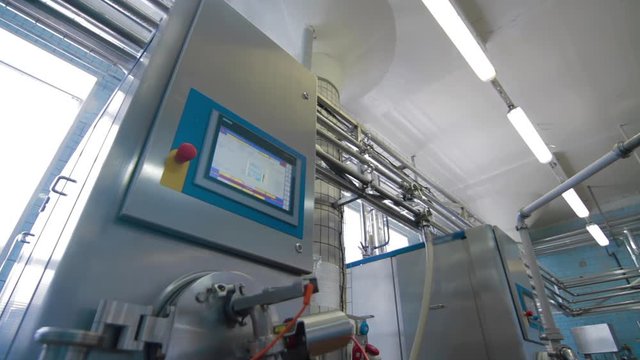 Modern equipment on ice cream factory. Cooling system in the interior of a modern factory, production line, dairy products.