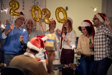 Business team celebrating new 2020 year in office