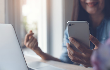 Business woman using smartphone