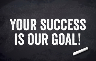 Black chalkboard with message Your success is our goal