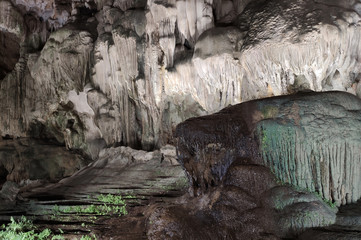 Stalagmites in Thien Cung Cave in Halong Bay in Quang Ninh Province, Vietnam. Amazing beauty of dolomite cave.